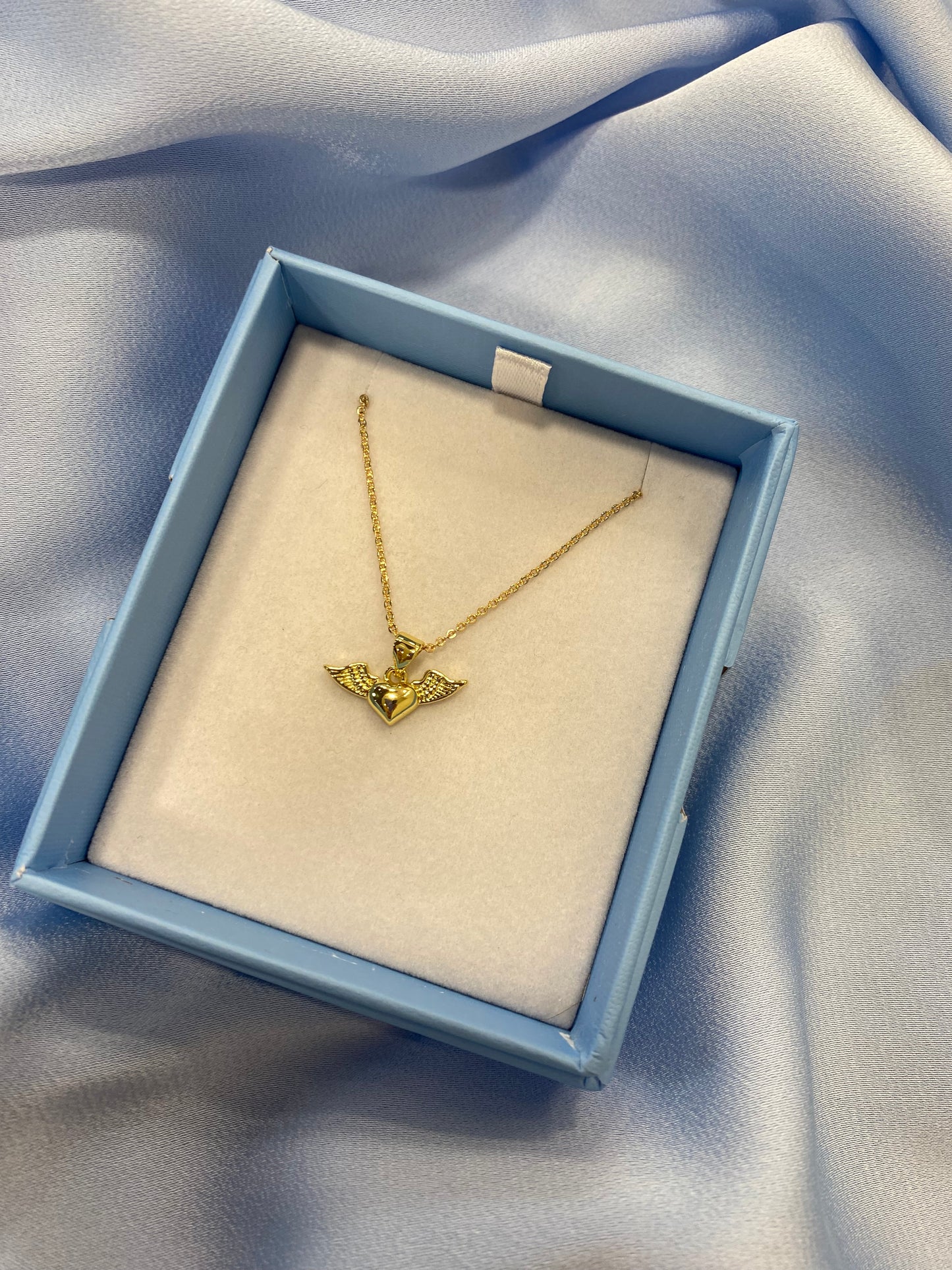 Gold winged heart necklace